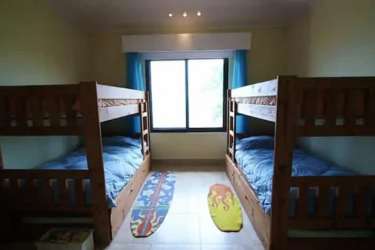 Bedroom with private balcony and ocean view at Riviera Maya Buenaventura Panama