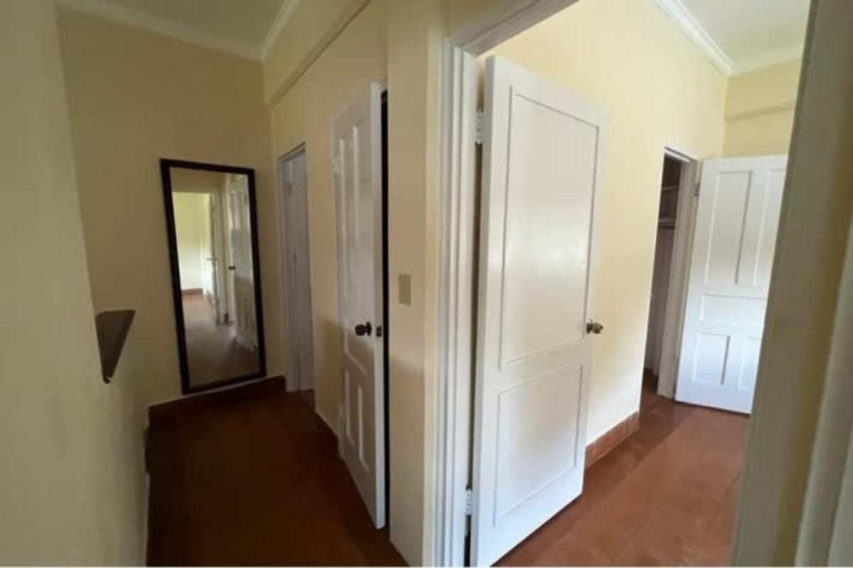 Renovated multi-story house Mediterranean style red roof garden Albrook Panama