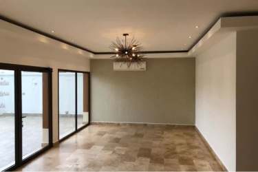 Spacious living room with sliding glass doors balcony Vista Mar Resort Panama