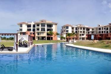 Modern condominium tower with balconies oceanfront at Vista Mar Resort Panama