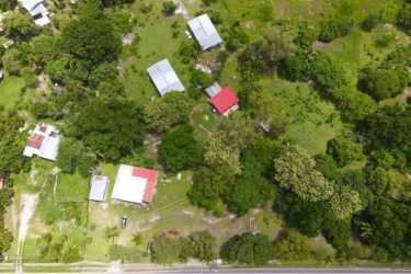 Aerial of rural estate multiple metal-roof buildings on 10,400m2 land for sale Las Lajas Coronado Panama