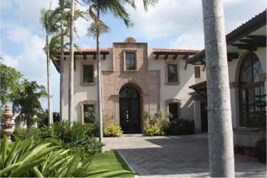 Mediterranean beachfront villa with white stucco and red tile roof in Vista Mar Panama Pacifico