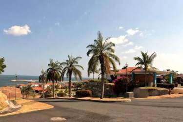 Mediterranean coastal homes with palm trees ocean view Vista Mar luxury community Panama