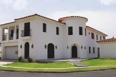 Mediterranean two-story villa with turret and balconies in beachfront Las Terrazas Panama