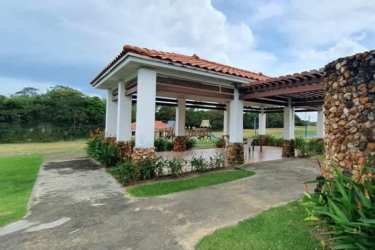 Thatched-roof gazebo, landscaped garden and hammock in Rodeo Viejo Country San Carlos Panama