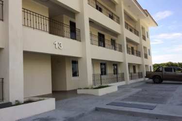 Multi-story modern beachfront apartment building at Marina Golf San Carlos Panama