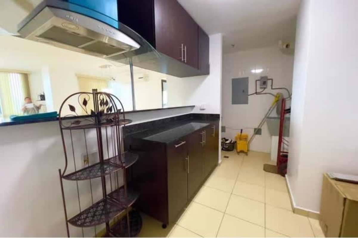 Bright dining and living room with tile floors in Macedonia Towers apartment Panama City