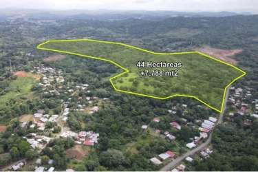 Aerial of 44-hectare land outlined in yellow near Arraiján, forests and suburban neighborhoods Panama