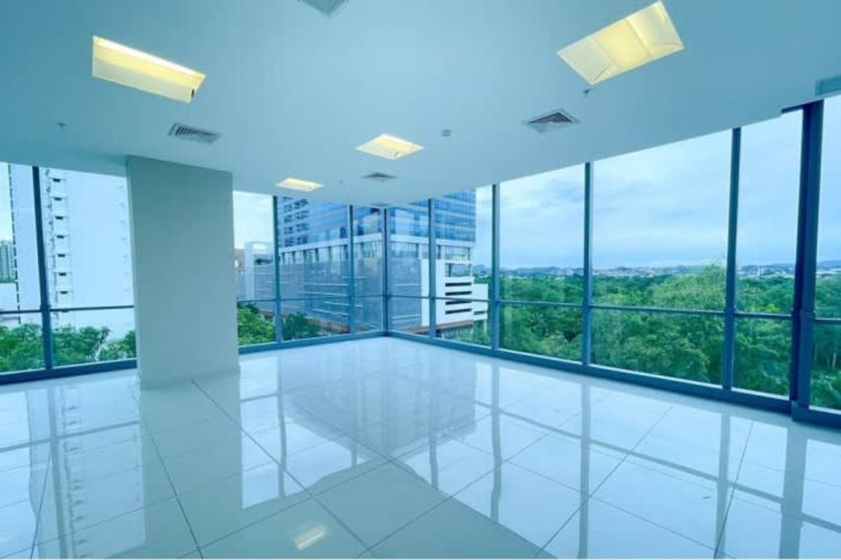 Bright empty office with panoramic windows tiled floors commercial rental Costa del Este Panama