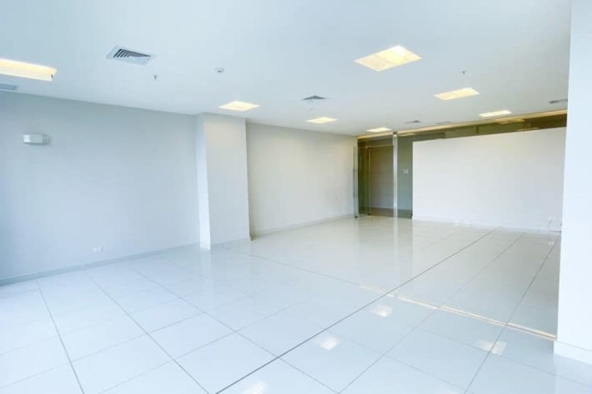 Vacant modern office panoramic windows porcelain floors HVAC Costa del Este Panama