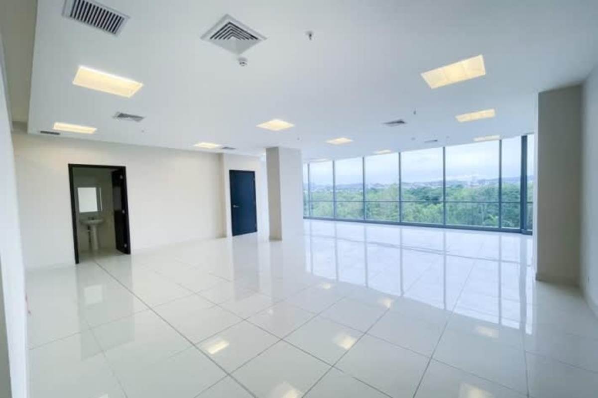 Commercial office space with large windows, tile floors, recessed lighting in Costa del Este Panama