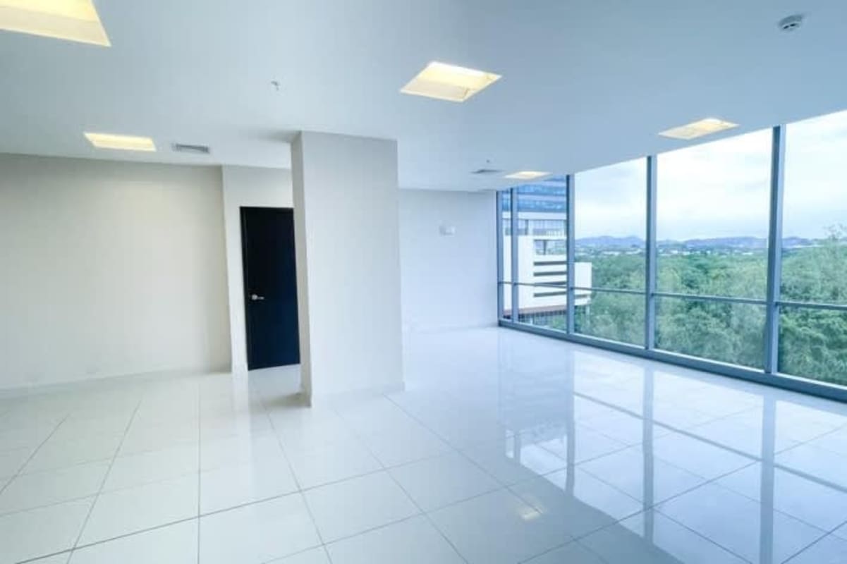 Modern commercial office with tile floors large windows recessed lighting Costa del Este Panama