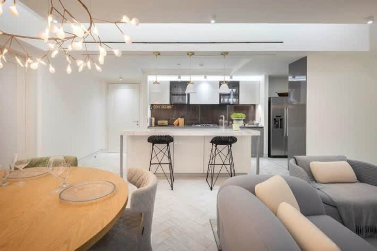 Modern kitchen marble countertops open concept PH Wanders Yoo apartment Marbella Panama