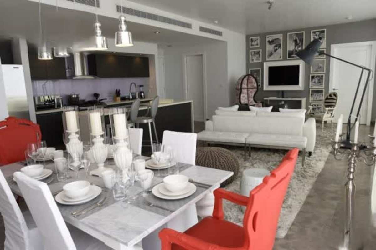Modern bathroom featuring walk-in glass shower, floating vanity and designer finishes in Yoo Panama