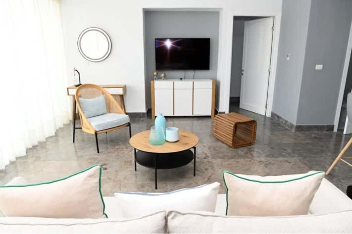 Double sink luxury bathroom with marble and ornate mirrors Yoo Panama Arts Tower