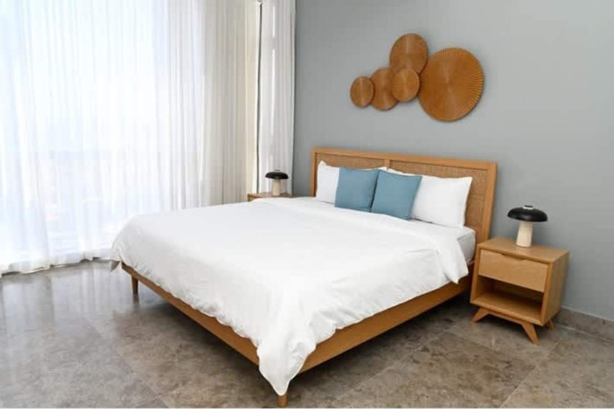 Modern dining table with city view large windows at Yoo Panama Arts Tower