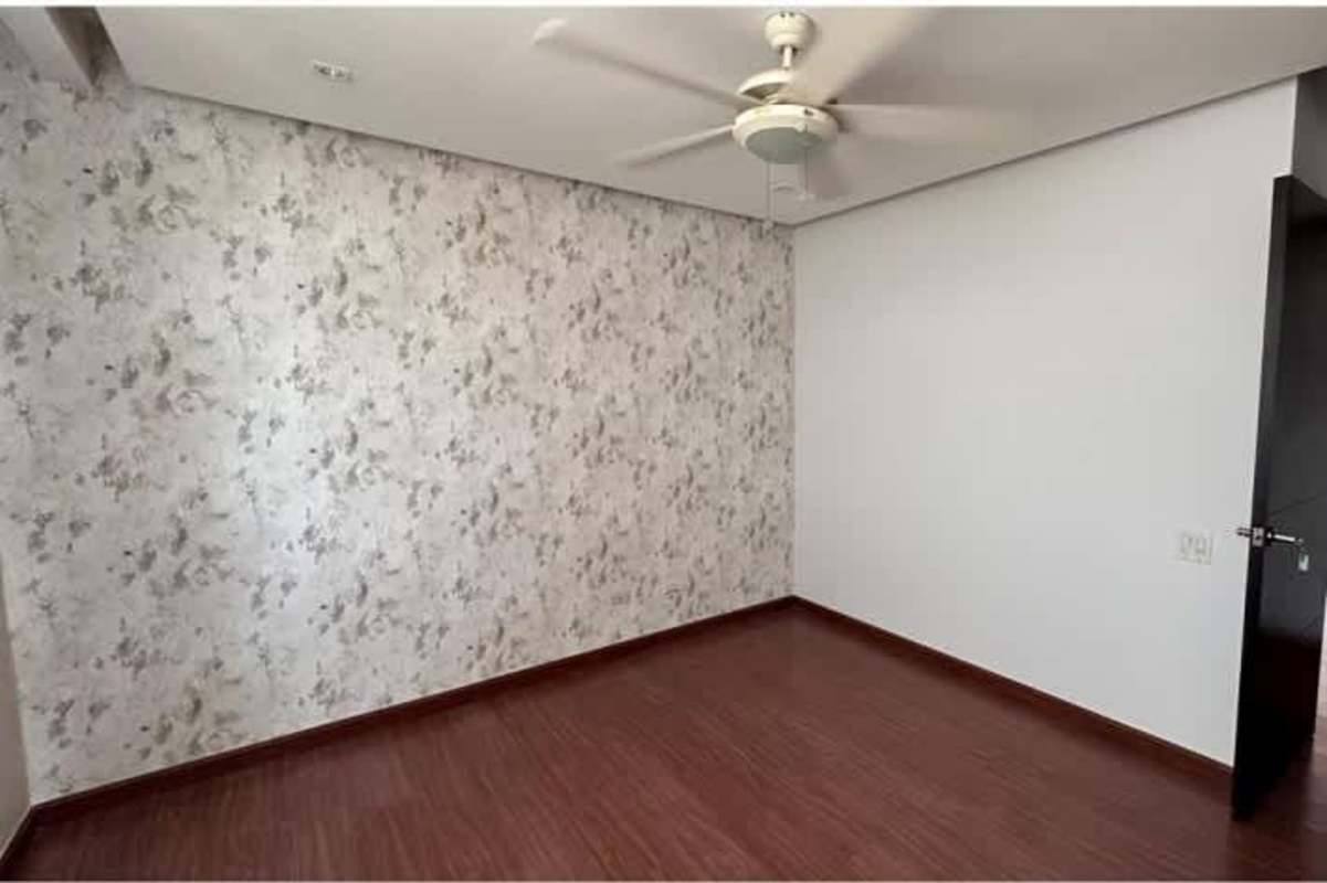 Spacious living dining area with balcony access in luxury condo PH Luxor Tower San Francisco Panama City