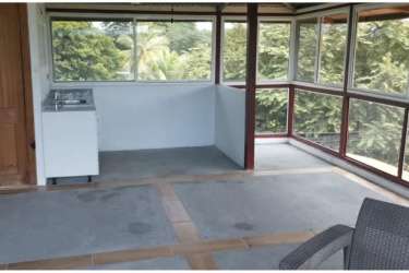 Spacious living area with ocean view terrace Gorgona beach villa Panama