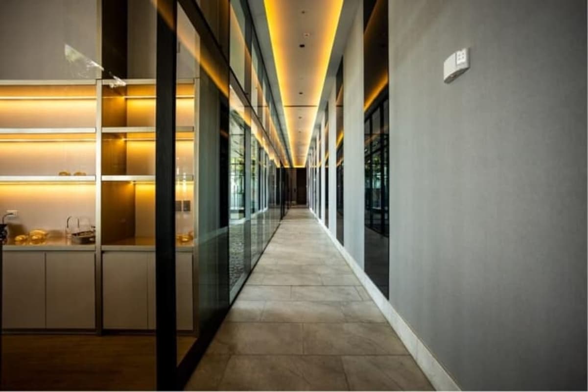 Rooftop pool lounge with palm trees and skyline views at Nuovo by Armani Panama