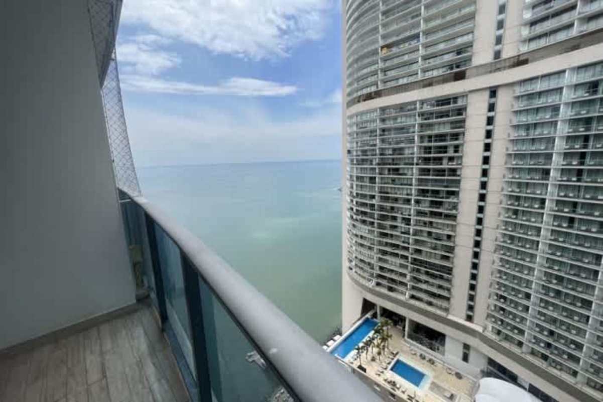 Open kitchen with granite countertops, tile flooring, modern cabinetry in PH Grand Tower Punta Pacifica Panama City