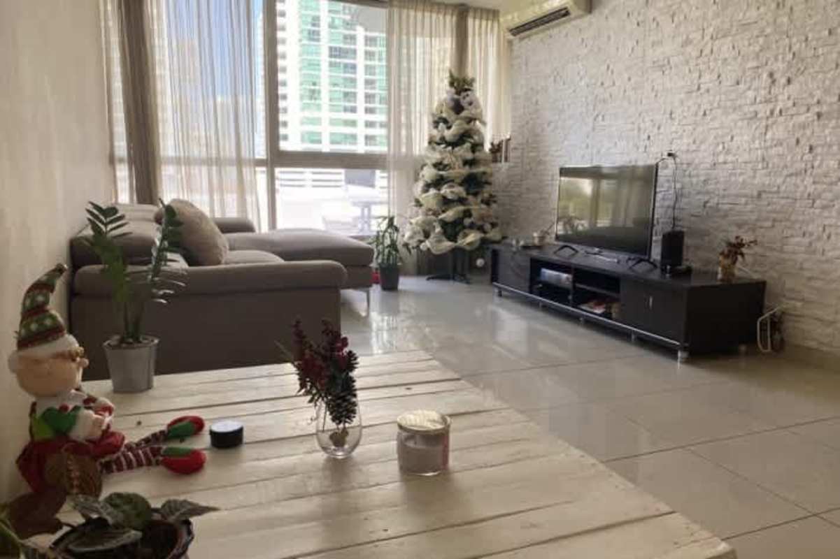 Modern kitchen with wood cabinets, granite countertops and appliances in PH San Francisco Bay Panama