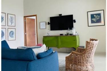 Fully equipped kitchen with granite countertops appliances open layout at Bijao Beach Residences Panama