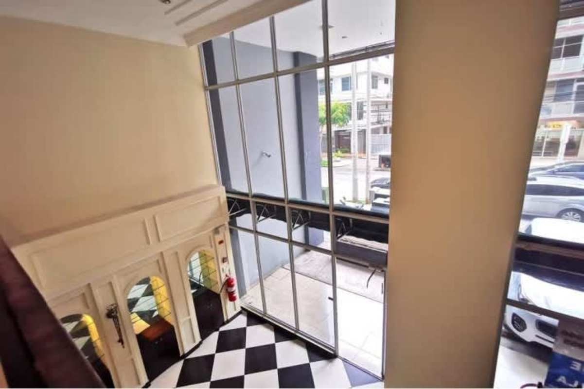 Showroom with mezzanine black white porcelain floor built-ins at PH Cangrejo Plaza Panama