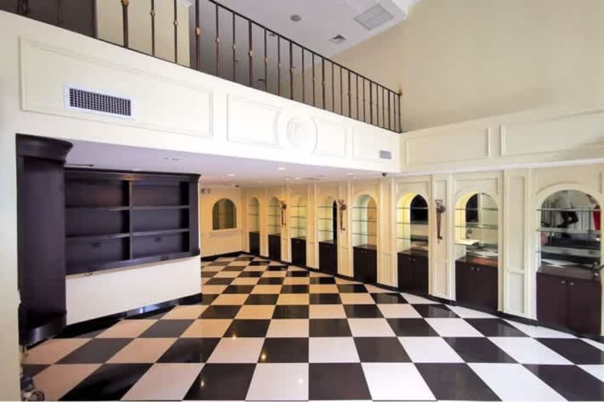 Reception with built-in counter and bathrooms in PH Cangrejo Plaza retail space El Cangrejo Panama City