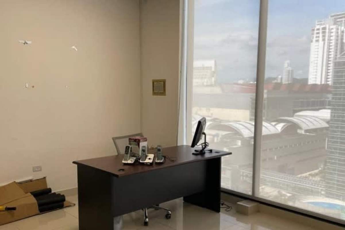 Private modern office workspace interior with large window city view in RBS Tower Punta Paitilla Panama