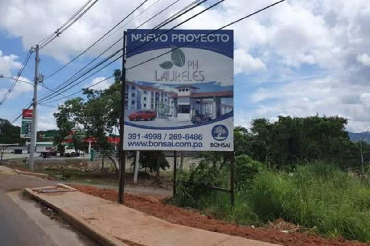 Outdoor billboard advertising PH Laureles real estate development near Villalobos Pedregal