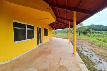 Covered patio balcony with mountain scenery at Las Lajas Chame Panama house
