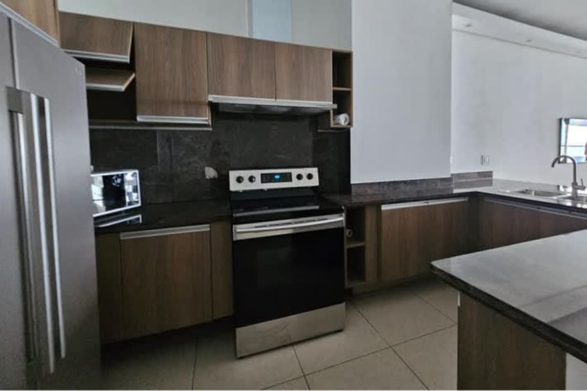 Master bedroom with balcony access and ocean panorama in PH Rivage Avenida Balboa Panama