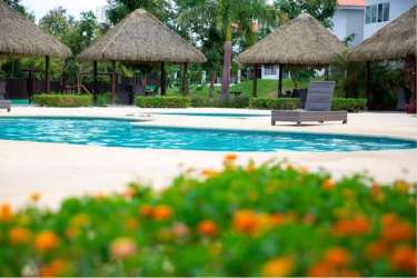 Private outdoor tiled shower with garden landscape in beach residence Coronado Panama