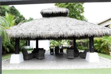 Gated tropical entrance of Paradise Point beach community in Coronado Panama