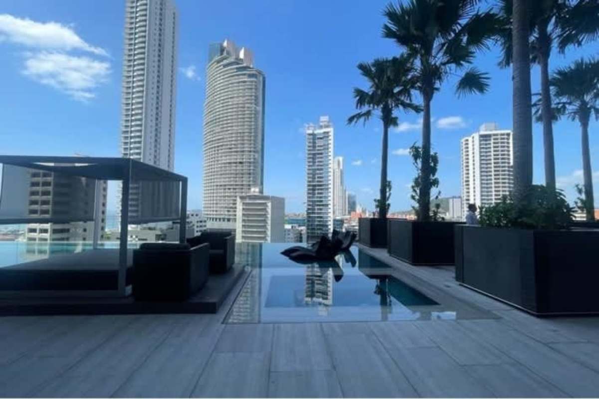Infinity pool rooftop with city and ocean views at PH Nuovo Armani Avenida Balboa Panama