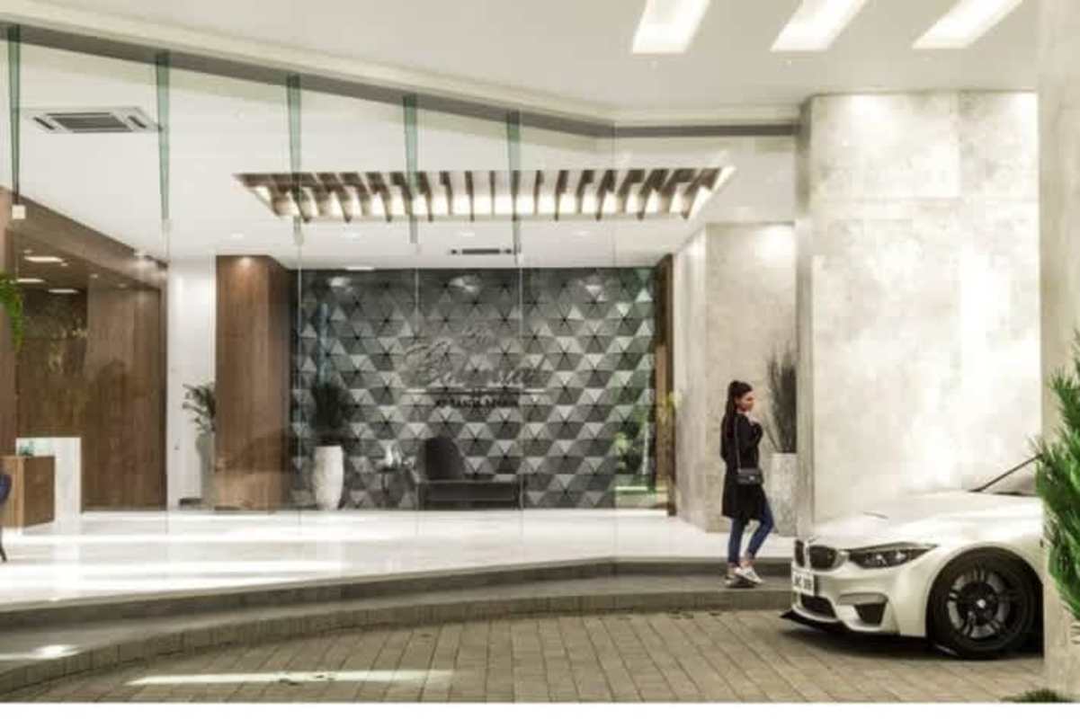 Modern high-rise condominium The Colonial Santa María with balconies and glass facade in Panama City