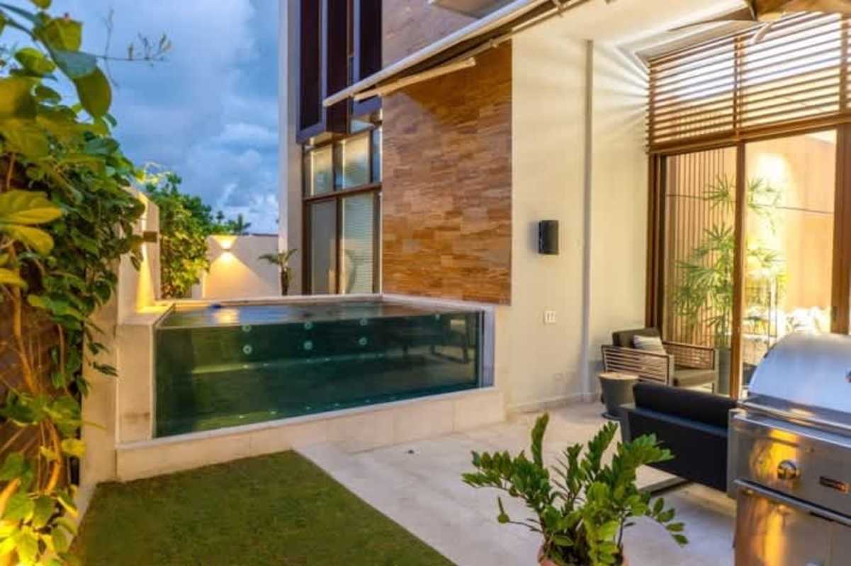 Sleek dining area with pendant lighting and city views in PH Garden Ocean Reef Islands Panama