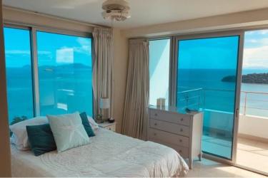 Luxury kitchen with stainless steel appliances granite countertops Casa Bonita penthouse Panama