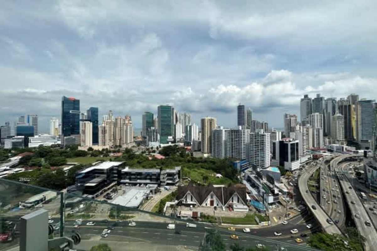 Aerial view of Panama City skyline with waterfront visible from Wanders Yoo apartments