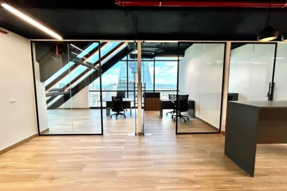 Office reception area with seating and bright natural light Tower Financial Center Panama