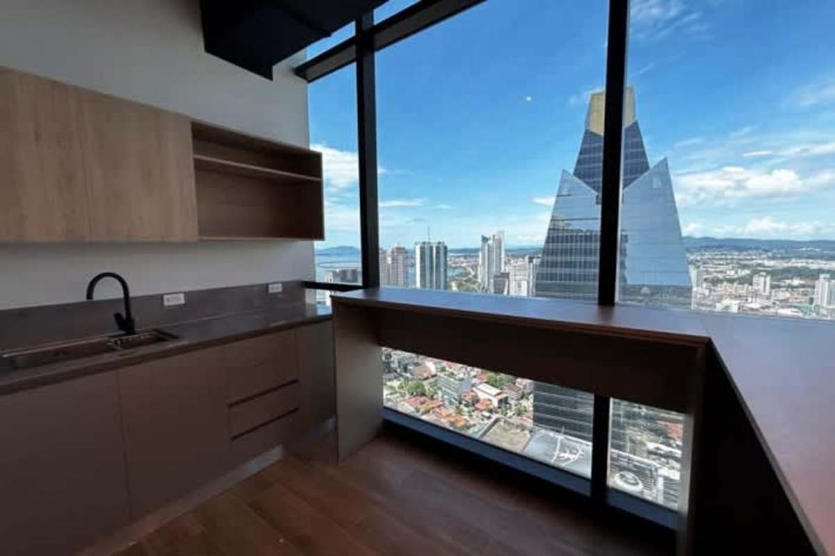 Small kitchenette with city skyline view Tower Financial Center Panama