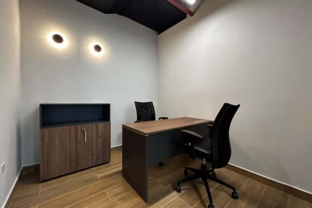 Contemporary glass-partition office area with wood flooring Tower Financial Center Panama