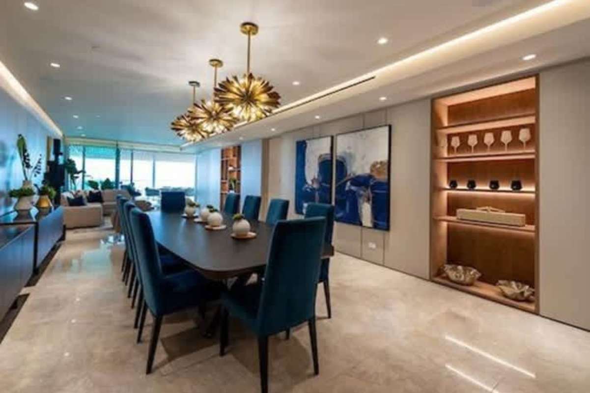 Open concept living and dining area with skyline views in PH Costanera Panama City