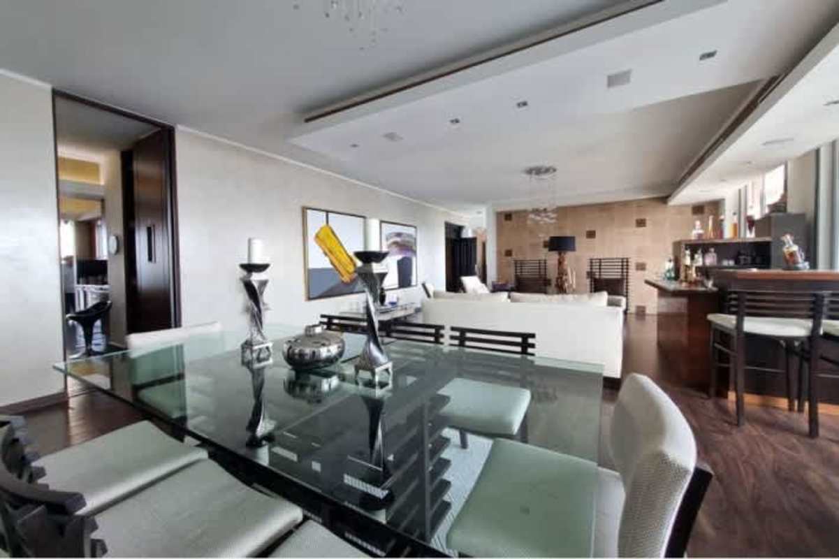 Elegant dining room with city views in luxury condo PH Aqualina Panama City