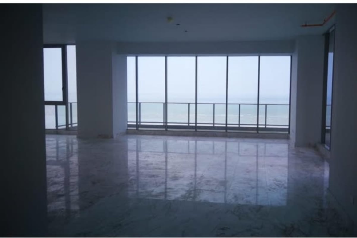 Modern empty apartment with marble flooring and panoramic Pacific Ocean view in PH Toledo Costa del Este Panama
