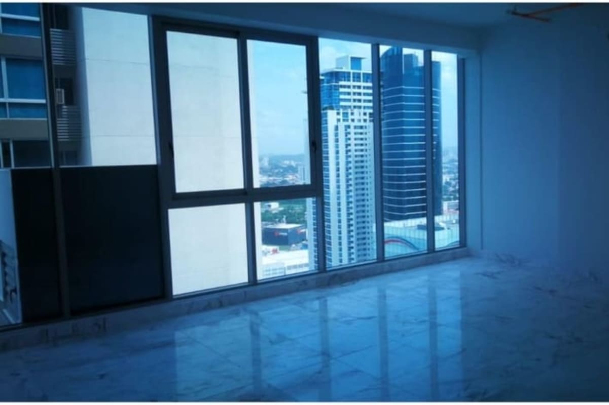 Balcony overlooking ocean bay and Panama city skyline in PH Toledo Costa del Este highrise