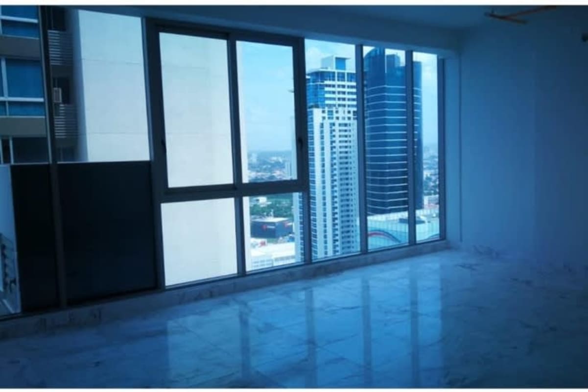 Large living dining space with marble floors and full ocean views PH Toledo Costa del Este Panama