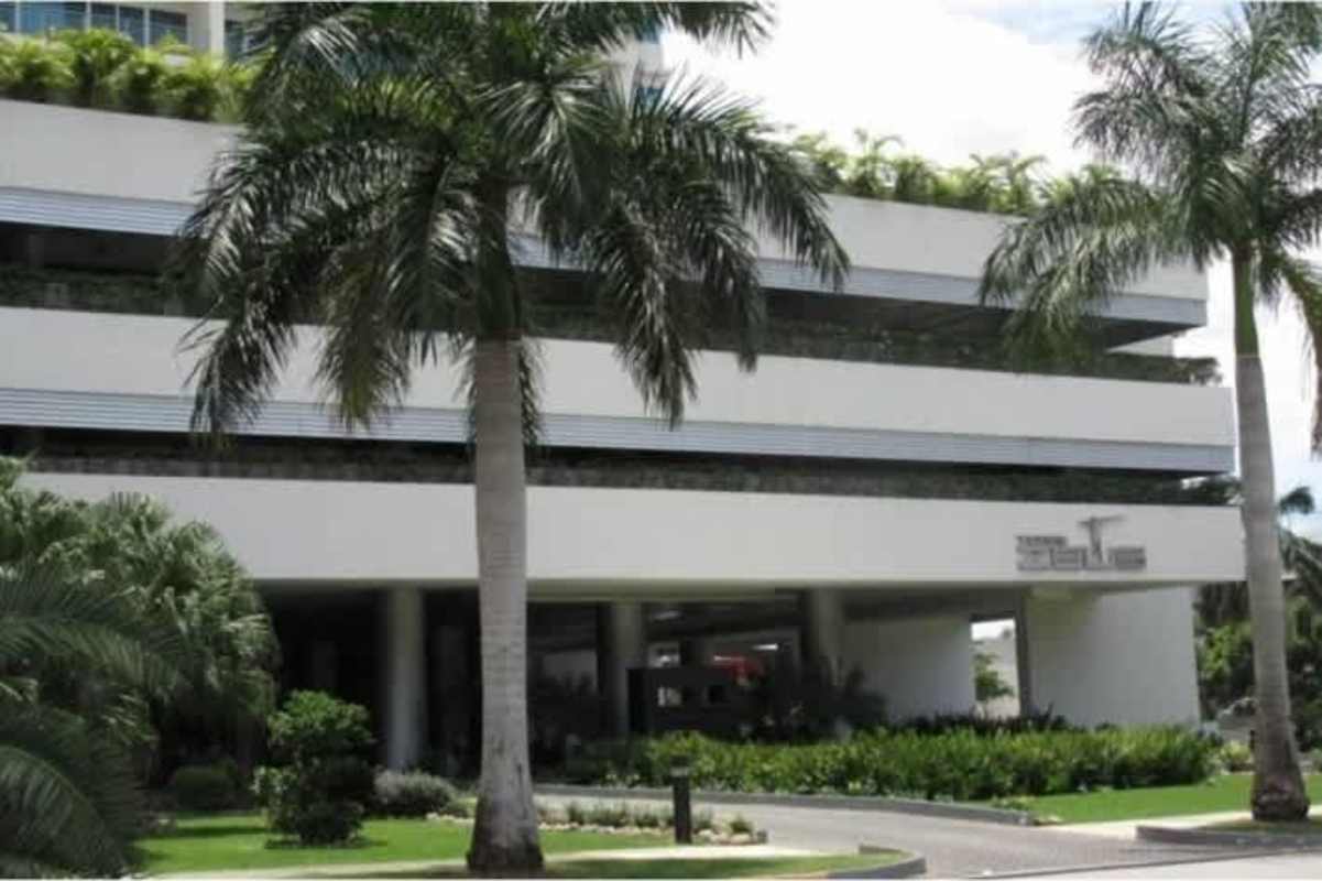 Raw luxury penthouse interior with panoramic ocean view through large windows in PH Zeus Panama City