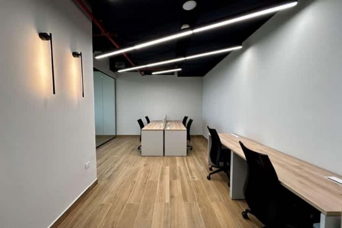 Corner office with floor-to-ceiling windows panoramic city views Obarrio Panama