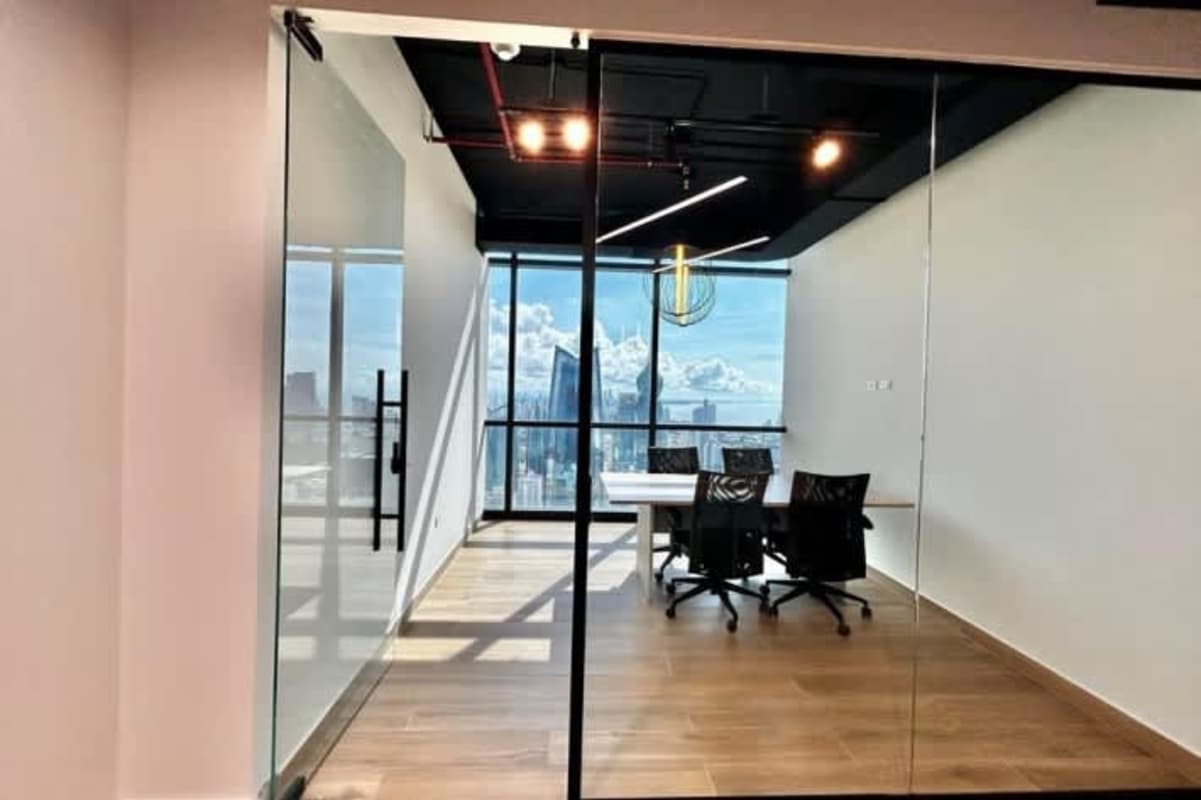 Office conference room with glass partitions modern décor Tower Financial Center Obarrio Panama